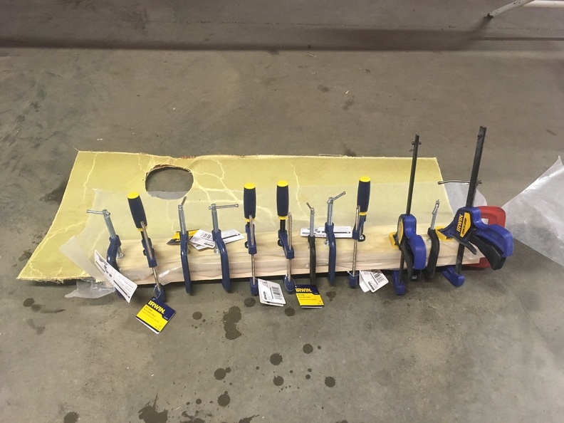 First deck section clamped with strip of Kevlar and Epoxy.jpeg